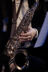 Saxophone musician in his hands closeup - 740087656