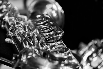 Close-up fragment of saxophone valves in black and white - 740087657