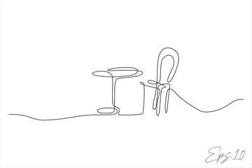 Continuous line drawing of chairs and table