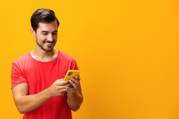Mobile man smiling communication yellow phone phone copy smartphone space portrait cyberspace happy