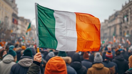 Naklejka premium Crowd of people with irish flag at the demonstration in Dublin, Ireland.