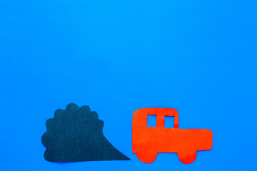 Kids paper car and traffic fumes - CO2 carbone dioxide control concept