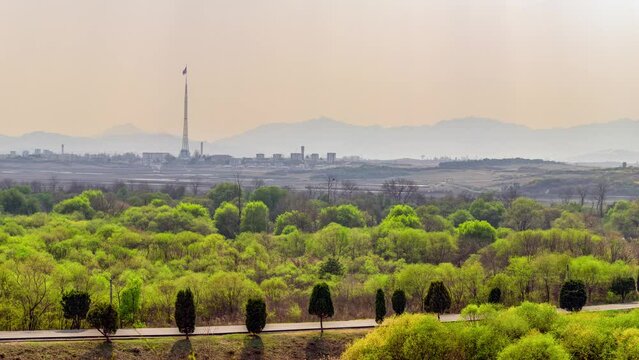 JOINT SECURITY AREA, PANMUNJEOM, SOUTH KOREA: tallest flag pole in the world with North Korean flag in Kijong-dong Village and site of the Axe Murder in the foreground
