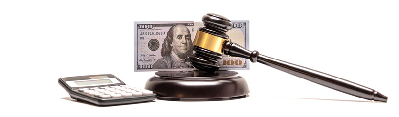 An isolated image of a judge's gavel on a stack of cash with a calculator, signifying legal fines...