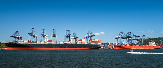 Docks in Panama Canal with Panama City skyline, Panama