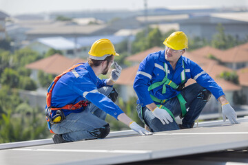 Fototapeta premium Engineer checking on solar panel on the factory rooftop