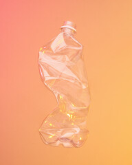 Crumpled plastic bottle. Garbage and contamination.