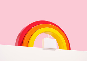 Rainbow and shopping bag. Sale concept. Weekend shopping.