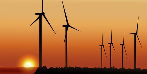 windmills producing electricity on the background of the sunset. the concept of eco energy generation.	