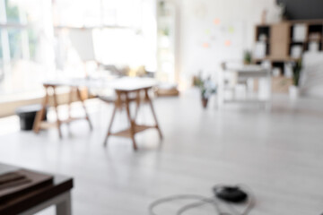 Blurred view of modern office with workplaces