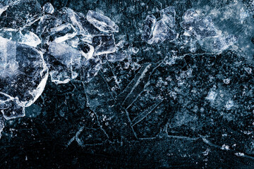 A crushed ice pieces on a dark ice background