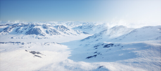 Fototapeta na wymiar Arctic landscape with snow mountains under a clear blue sky.