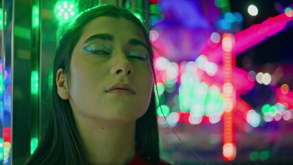 Portrait attractive model resting illuminated park. Thoughtful teenager waiting 