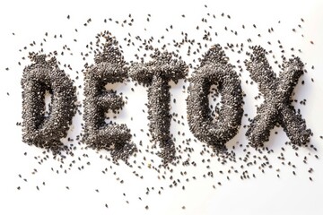 the word detox is formed using various seeds. The seeds are neatly arranged to create each letter, resulting in a visually striking and creative representation of the term 1detox