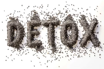 Fotobehang the word detox is formed using various seeds. The seeds are neatly arranged to create each letter, resulting in a visually striking and creative representation of the term 1detox © nnattalli