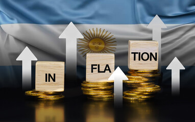 Stack of coins and rising arrows on wooden cubes with inflation texts with Argentina flag...