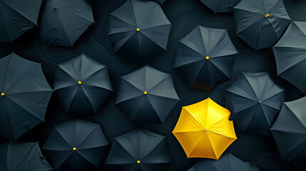 Banner with a yellow umbrella on a background of black umbrellas. Concept template of exclusivity, safety and leadership with space for text