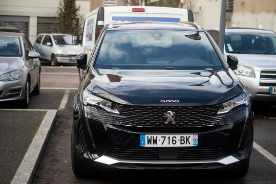 Mulhouse - France - 18 February 2024 - front view of black Peugeot 5008 parked in the street