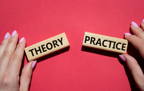 Theory or Practice symbol. Concept word Theory or Practice on wooden blocks. Businessman hand. Beautiful red background. Business and Theory or Practice concept. Copy space