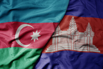 big waving national colorful flag of cambodia and national flag of azerbaijan.