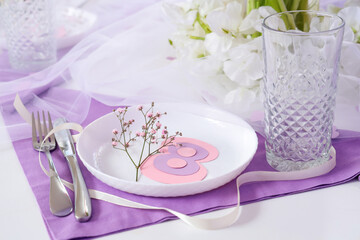 Simple table setting for International Women's Day celebration, closeup