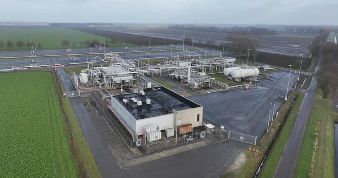 Earthquakes due to gas extraction, natural gas field installation in Groningen. Aerial birds eye view.