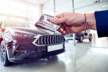 the buyer keeps dollar money for purchse brand new cars at the dealer showroom. Buy  rent car...