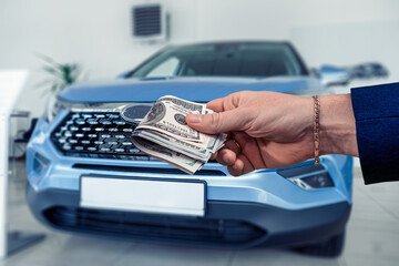 the buyer keeps dollar money for purchse brand new cars at the dealer showroom. Buy  rent car...