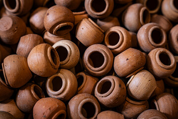 Many handcraft claypots, Rows of ceramics Thai Earthware at Ko Kret island, Nonthaburi, Thailand.