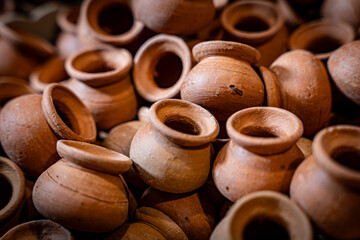 Many handcraft claypots, Rows of ceramics Thai Earthware at Ko Kret island, Nonthaburi, Thailand.