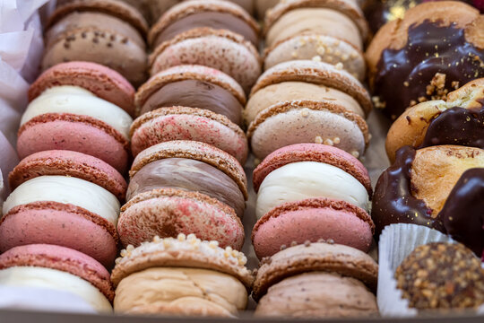 Sweet hand made macarons as delicious french dessert background