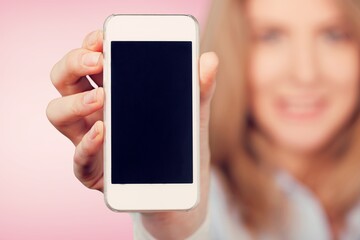 Young female  hold the mobile phone