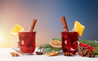 Mulled wine with fresh orange, apple fruits