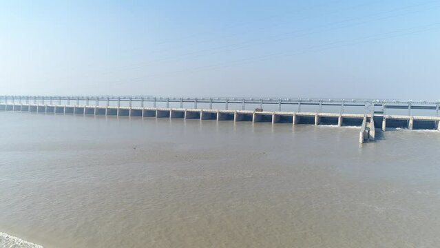 Aerial view of Head Taunsa Barrage is a barrage on the Indus River in Tehsil Taunsa, Dera Ghazi Khan District, Punjab Province, Pakistan. Where a lot of water is stored. Beautiful drone 4K view.
