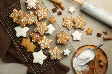 Flat lay composition with tasty Christmas cookies and spices on light table