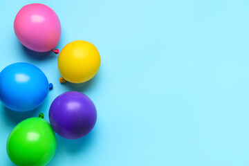 Colorful balloons on blue background