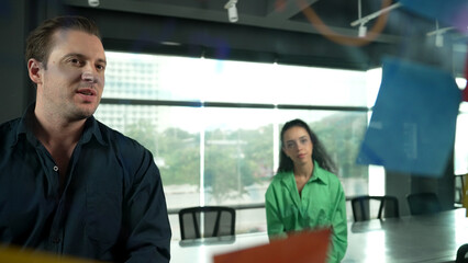 Professional business people discuss about creative marketing idea in modern office. Business team...