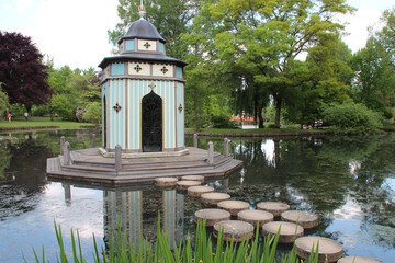 folly and lake in a park in apremont-sur-allier in france 