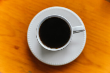 American coffee served in a white cup, freshly ground from the recent harvest.