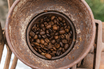 Fototapeta premium Coffee beans ready to be ground in a grinding machine.