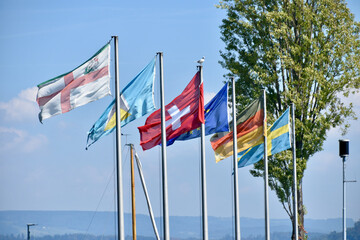 Row of Flags at Mainau Ferry Port in Lake Constance, Germany
