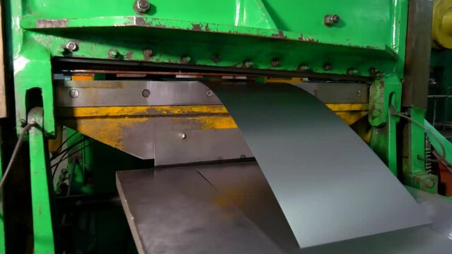 Rolls of sheet steel for press forming of products in the factory. Steel sheet in coils. 