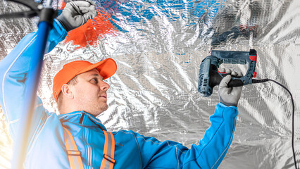 The builder is fastening the vapor barrier under the ceiling thermal insulation using an electric stapler.  The vapor barrier as protection of thermal insulation against internal moisture.