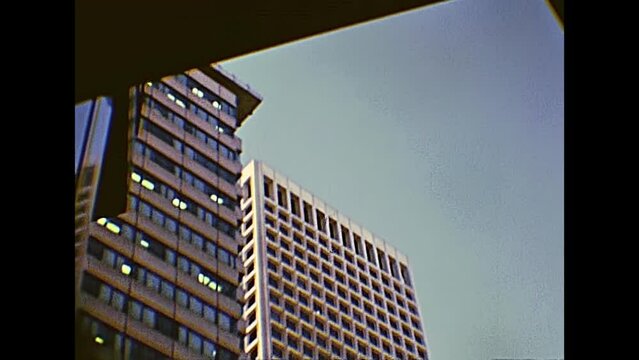 San Francisco, United States - in 1980: 1980s buildings in San Francisco skyline with skyscrapers from ground view,California street. Archival footage in 1980s, California, United States in year 1980.
