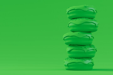 Stack of glazed donut with sprinkles on plain monochrome green color