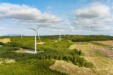 Connemara aerial landscape with wind turbines of Galway Wind Park located in Cloosh Valley, County Galway. Largest onshore wind farm in Ireland. Galway Wind Way recreation.