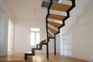 Metal staircase in modern home interior
