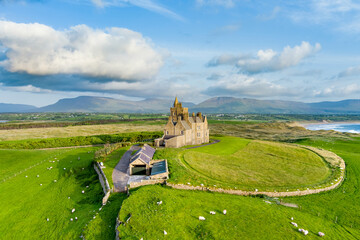 Classiebawn Castle on a backdrop of picturesque landscape of Mullaghmore Head. Spectacular sunset...