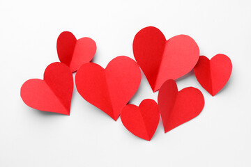 Paper hearts on white background, flat lay