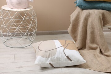 One soft pillow on light floor indoors